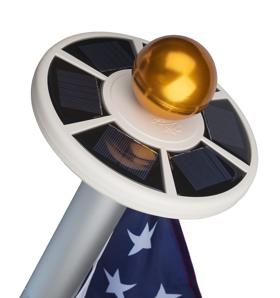 Sunnytech 2nd Gen solar flag light on a flagpole at dusk, enhancing visibility