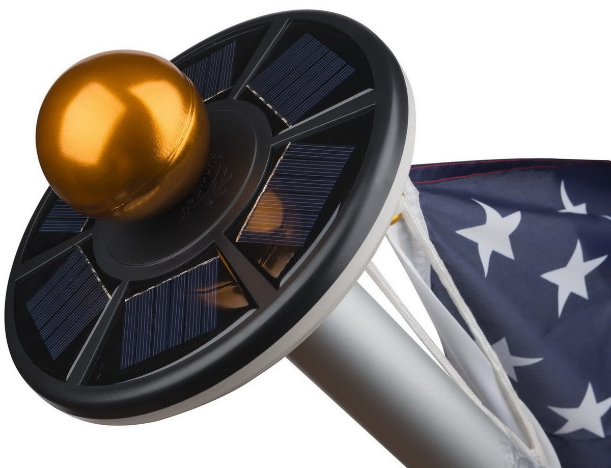 Sunnytech 2nd Gen solar flag light on top of a flagpole for bright dusk visibility.