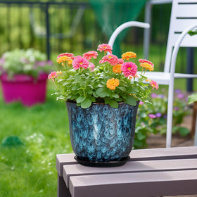 SUNPOTFOR planter with drainage hole and saucer promoting healthy root care.