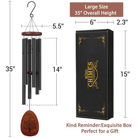 Suntimber Tree of Life wind chimes hanging in garden, enhances outdoor remembrance.