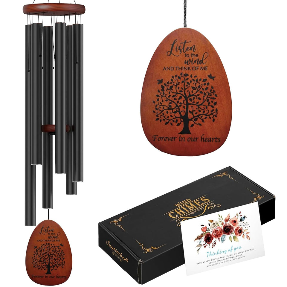 Suntimber Tree of Life wind chimes outdoors, serene memorial ambiance.