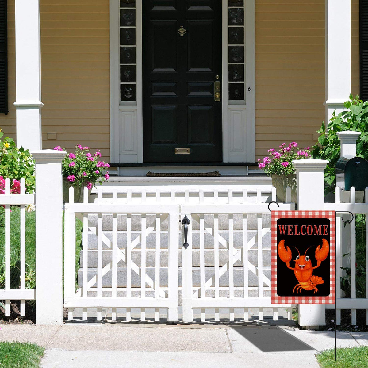 Sunwer Crawfish Garden Flag outdoor setting on porch or lawn.