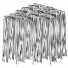 SuperMMarK 6-inch 11-gauge galvanized stakes securing weed barrier fabrics in outdoor gardens
