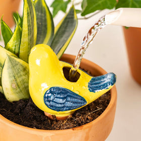 Sure Yuesi pink bird globe helps prevent under and over-watering.