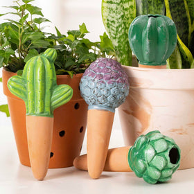 Sure Yuesi cactus-shaped terra cotta watering globe provides gentle, slow-release hydration for potted plants.