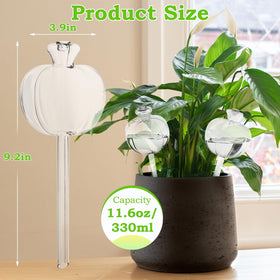 Suyeah Self-Watering Globes in soil provide steady moisture for outdoor planters.
