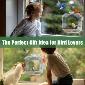 SVEDVK feeder with suction cups staying steady on window glass