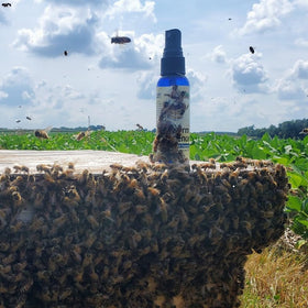 Clear packaging shows Swarm Science branding and lure benefits for beekeepers.
