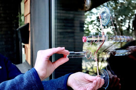 Sweet Feeders dishwasher-safe glass bottles for easy cleaning.