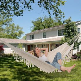 SXSEAGLE spacious two-person hammock ready for lounging outdoors or indoors.