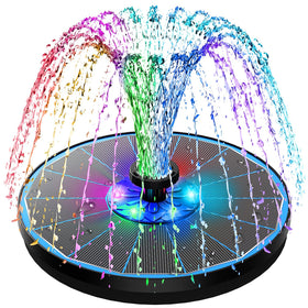 SZMP 3.5W glass panel fountain casts a stable daytime spray in a blue garden feature.