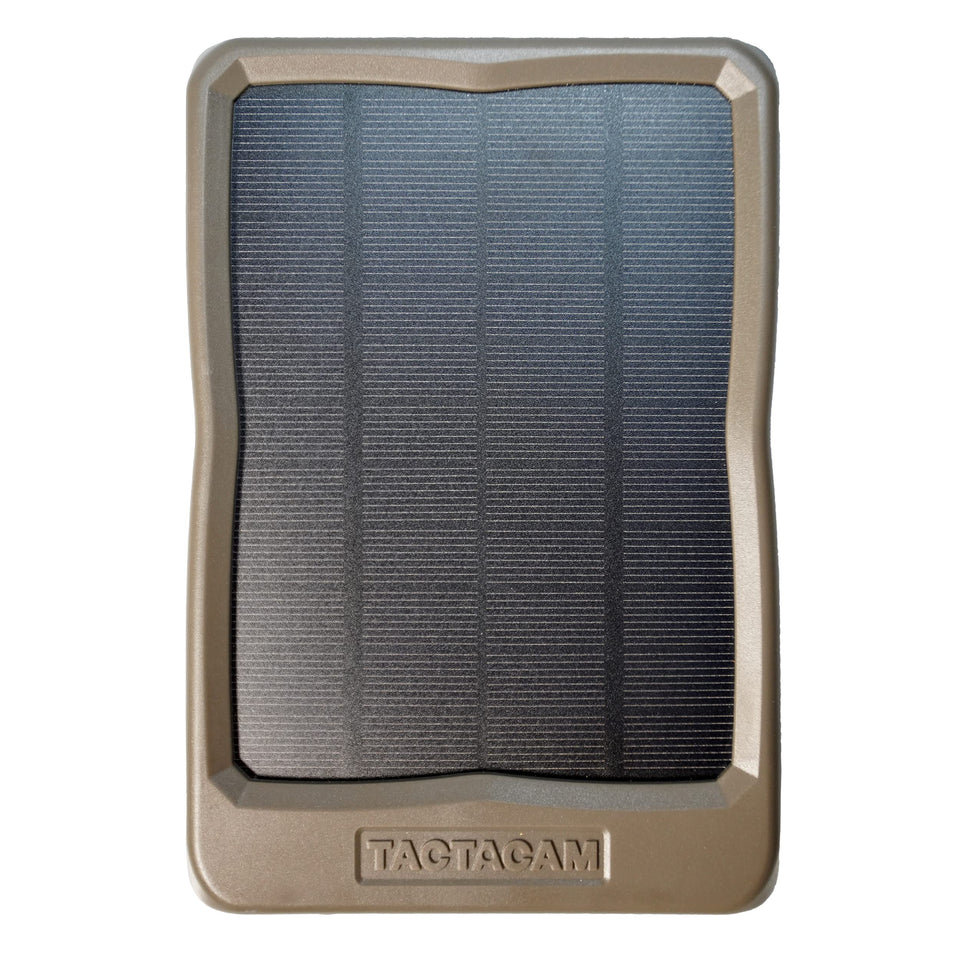 TACTACAM Reveal solar panel powering a trail camera in the field