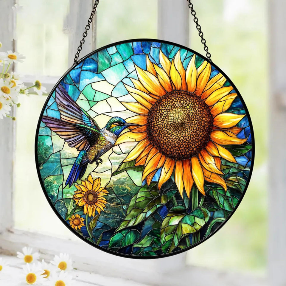 Tatkuink hummingbird sunflower suncatcher hanging in window, vibrant colors in sunlight.