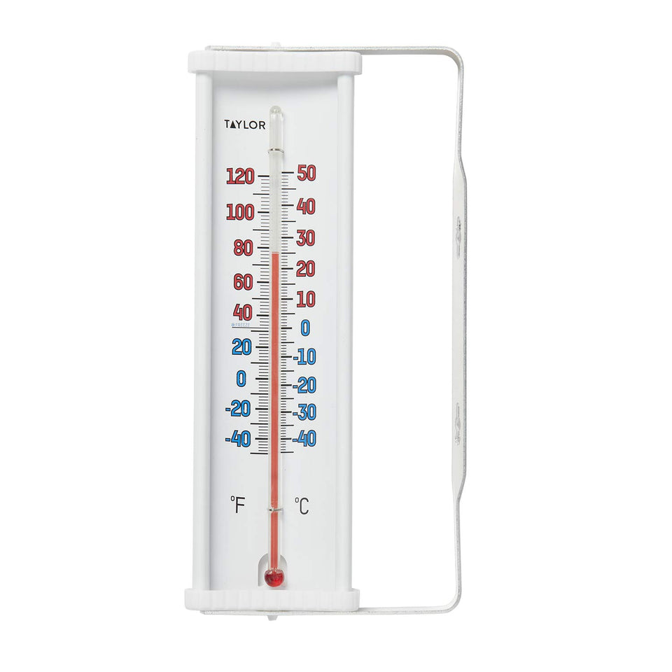 Taylor window thermometer tilted for easy outdoor viewing from doorway.