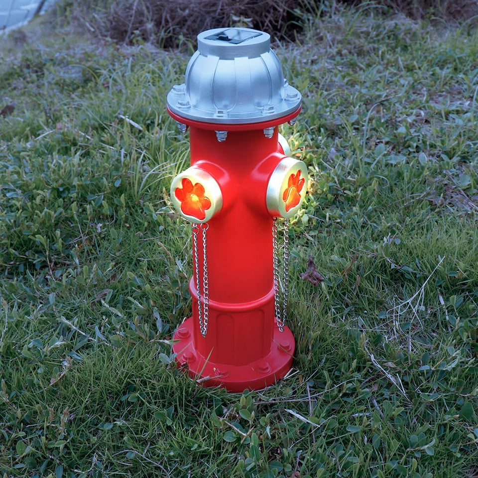 TB TIBAG fake fire hydrant dog pee post guiding pets to a designated bathroom area.