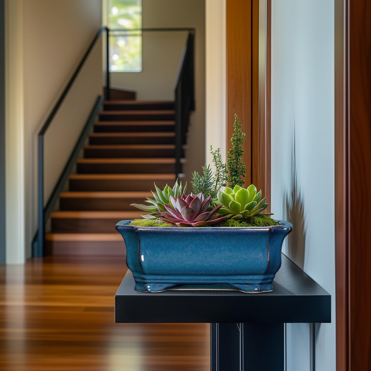 Blue reactive glaze complements modern living spaces.