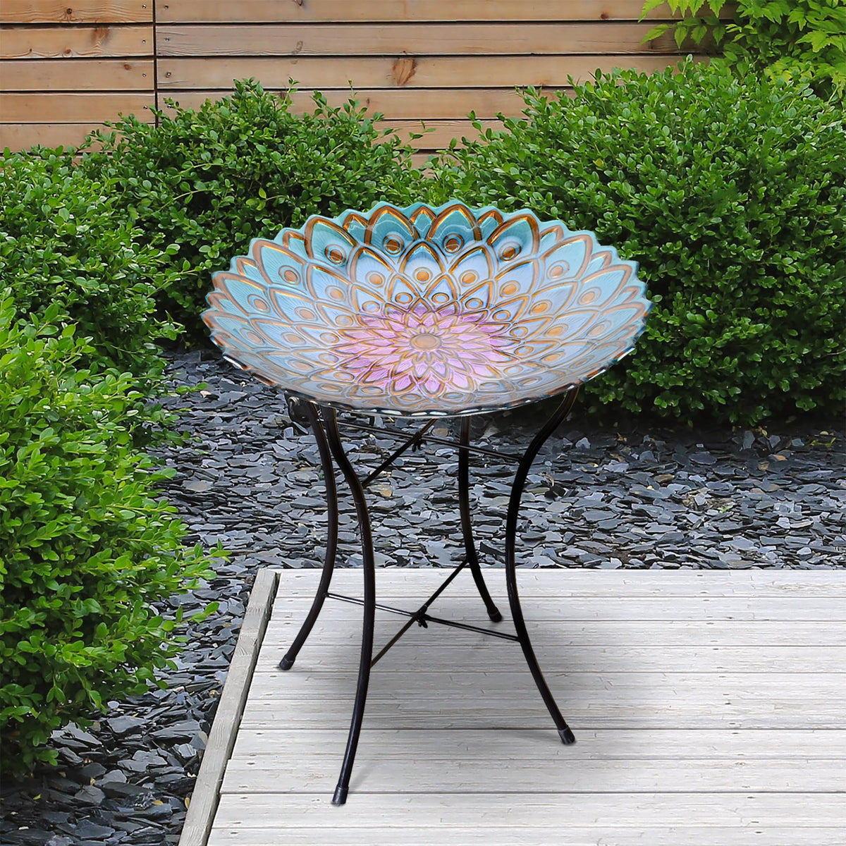 Teamson Home 21-inch height bird bath stands in garden spaces.