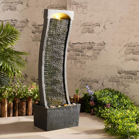 Teamson Home curved faux slate fountain viewed from the side showing flowing water.