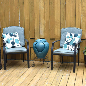 Teamson Home teal pot fountain compact size ideal for small patios.