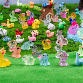 Teenzee detailed resin animal figures close-up showing glossy finish