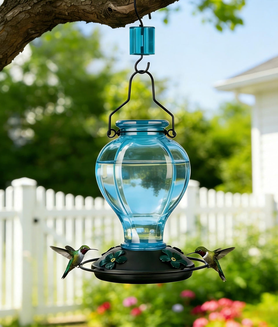Tegarbed glass hummingbird feeder with blue glass front view attracting hummingbirds to your garden.