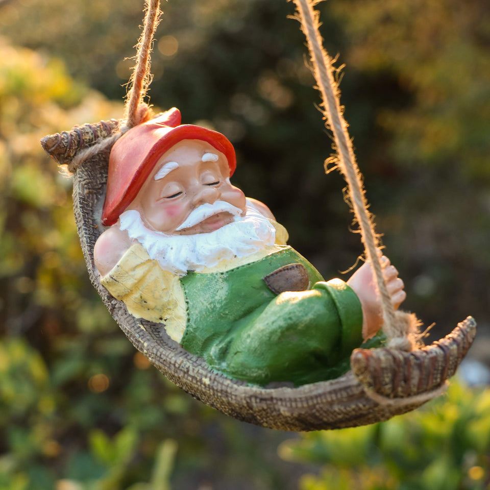 Teresa's Collections green gnomes in a hammock for outdoor charm