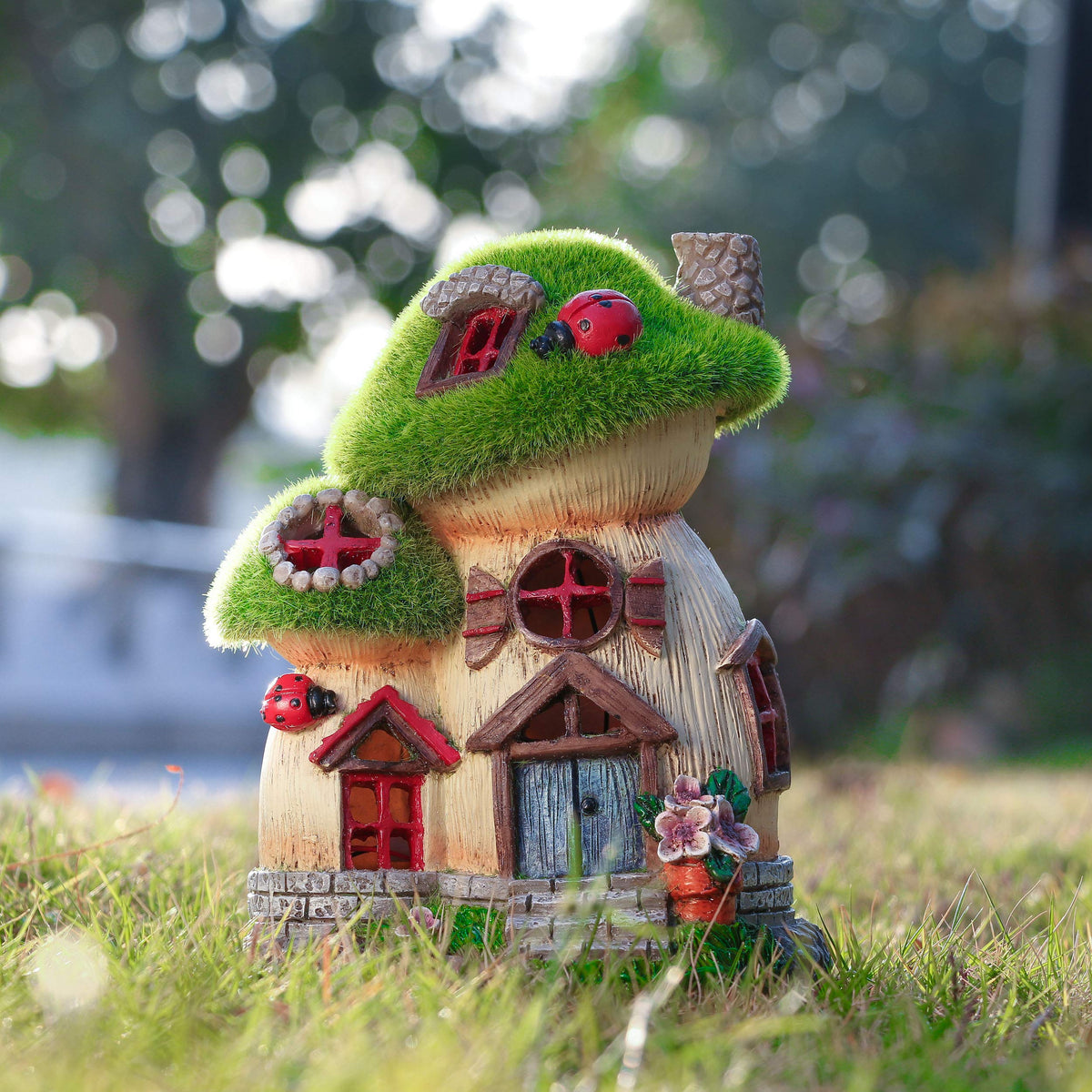 TERESA'S COLLECTIONS Outdoor solar light glows softly at night.