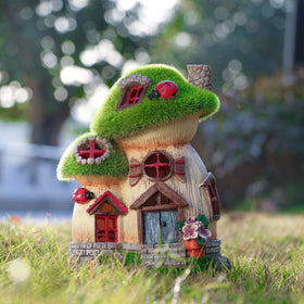 TERESA'S COLLECTIONS Outdoor solar light glows softly at night.