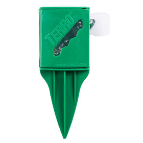 Terro T1812-2 bait stake installed in ground beside ant trails for targeted control.