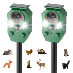 TFKK 2-pack solar ultrasonic repeller in action deters pests from gardens.