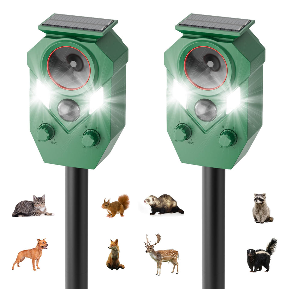 TFKK 2-pack solar ultrasonic repeller in action deters pests from gardens.