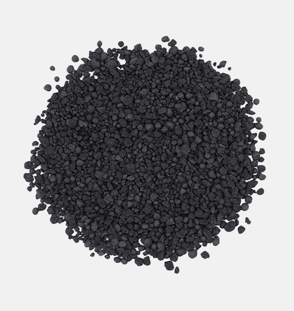 The Andersons BioChar DG granules dispersing in soil for even coverage.
