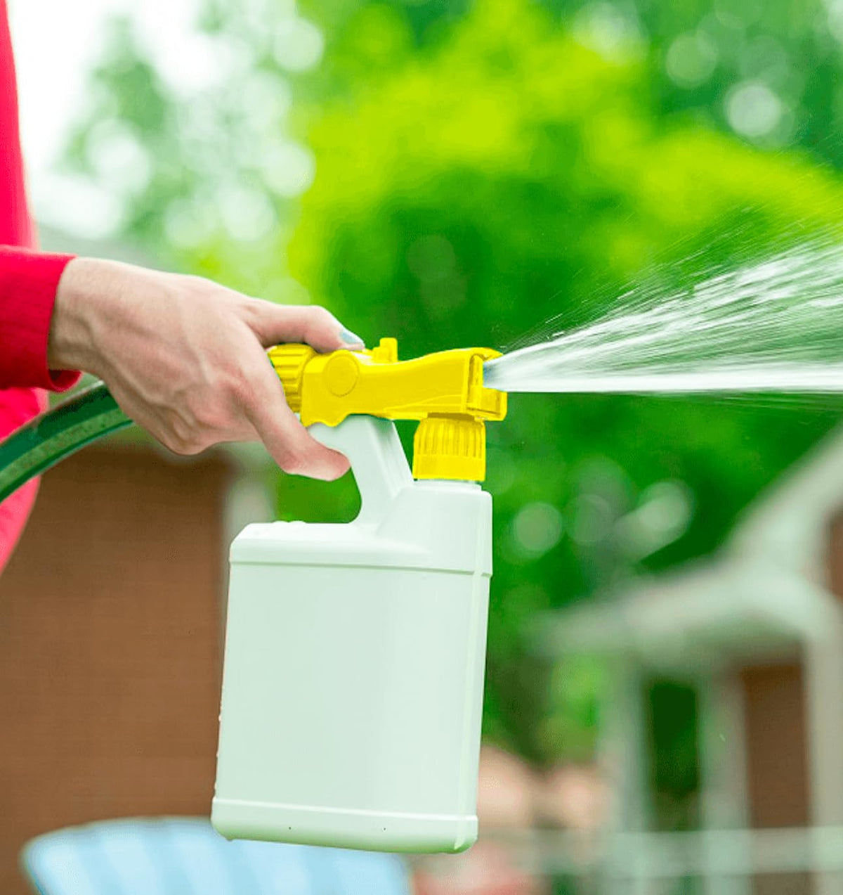 The Andersons sprayer bottle-fill is quick and simple for soluble lawn treatments.