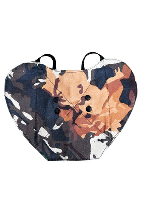 The Chicken Chick Hen Saddle double snaps ensure secure closure during active days.