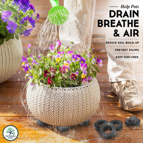 The Garden Gecko surface grip feet keep pots secure on various floors.