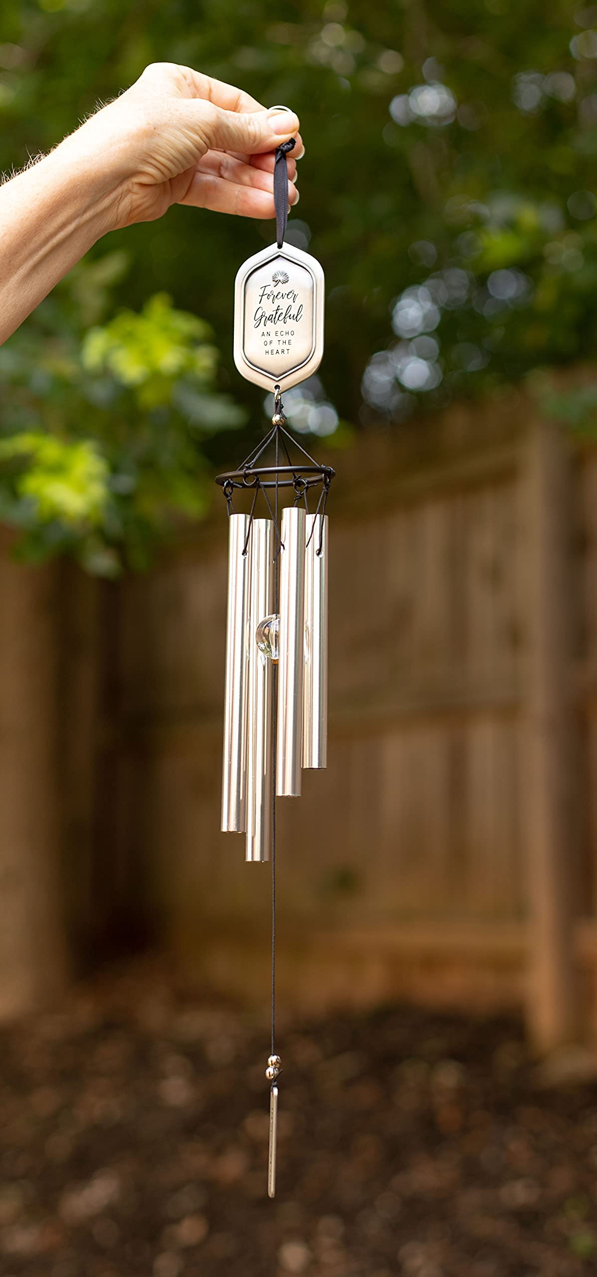 The Grandparent Gift Co Forever Grateful wind chime card doubles as a bookmark and keepsake.