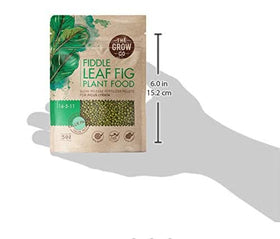The Grow Co Fiddle Leaf Fig Tree Plant Food pellets close-up showing slow-release nutrition for roots
