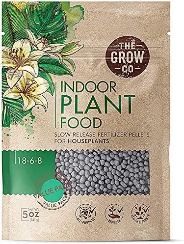 The Grow Co Indoor Plant Food bottle close-up boosts plant vitality