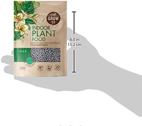 The Grow Co Indoor Plant Food pour demonstrates simple feeding for pots