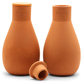 The Olla Company Classic Olla with lid enables simple, self-watering irrigation for busy gardens.