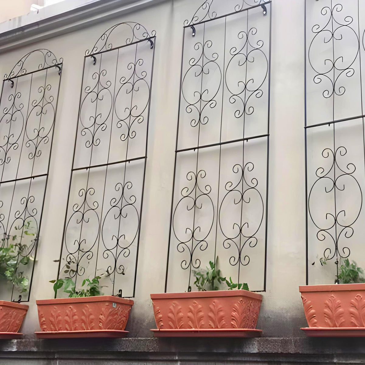 Thealyn trellis with flexible layout configuration for varied garden designs.