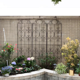 Thealyn garden trellis adds elegant contrast to plants and spaces.