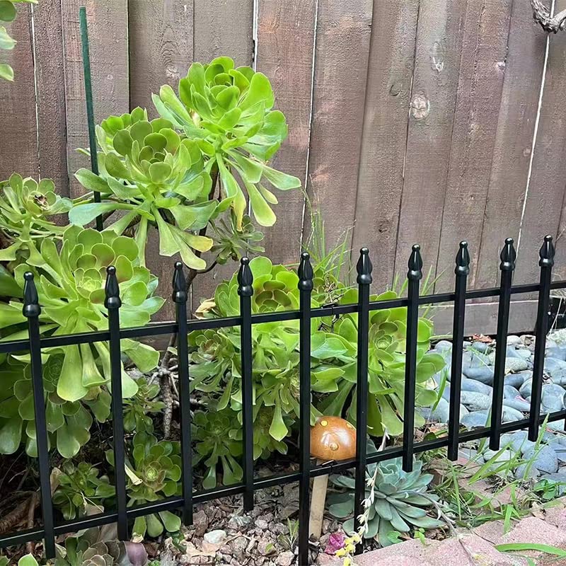 Thealyn yard border fence adds architectural interest while keeping edges tidy.
