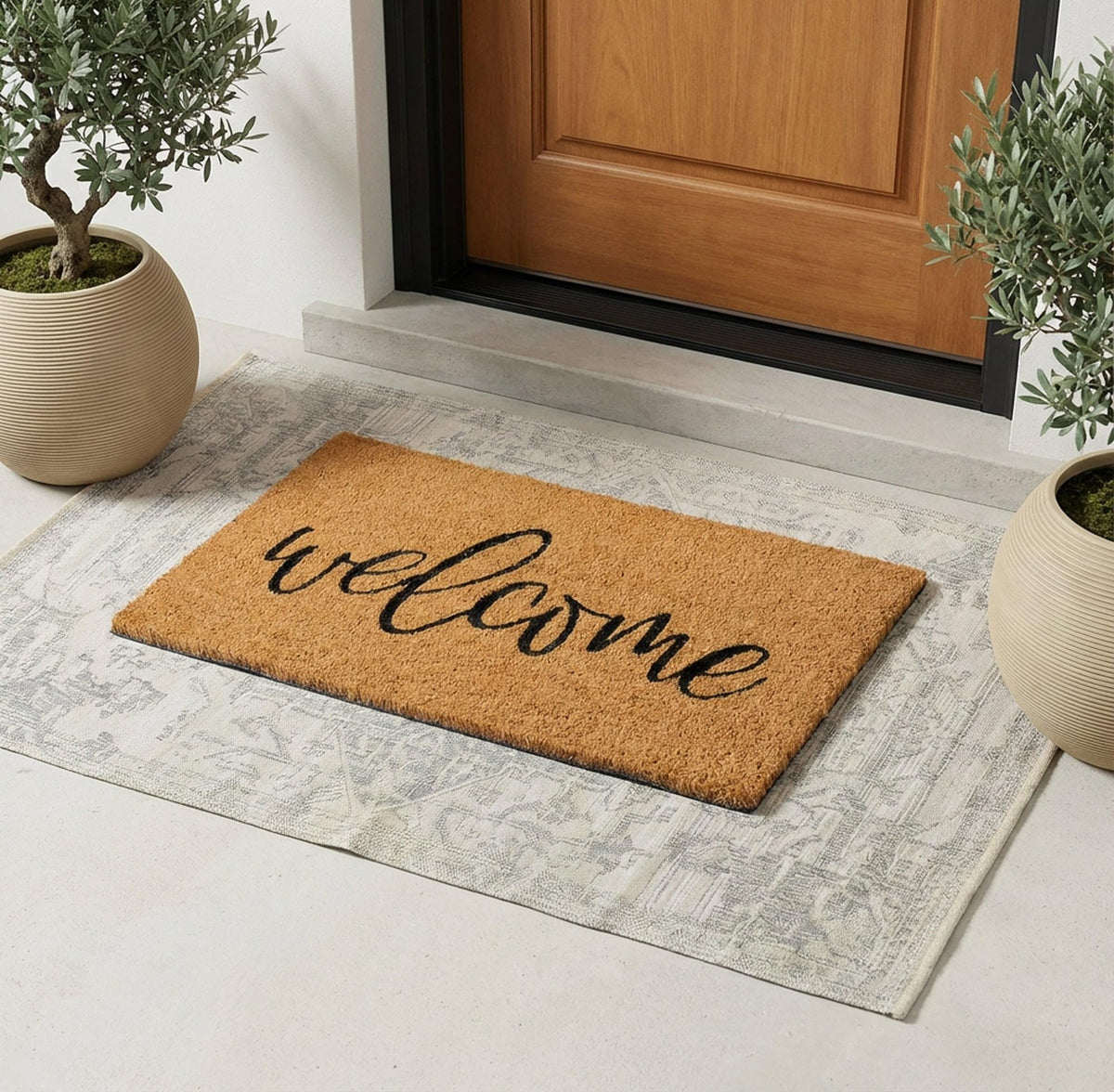Theodore Magnus coir doormat close-up shows natural fibers trapping dirt.