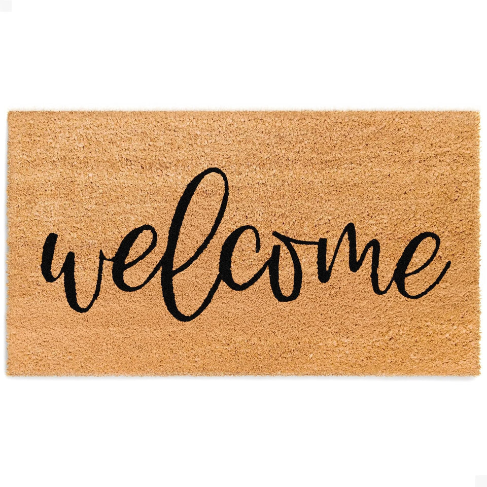 The Theodore Magnus door mat greets guests at the front door with style.