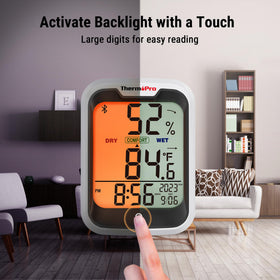 ThermoPro TP358 clock with backlit display reads easily in dark.