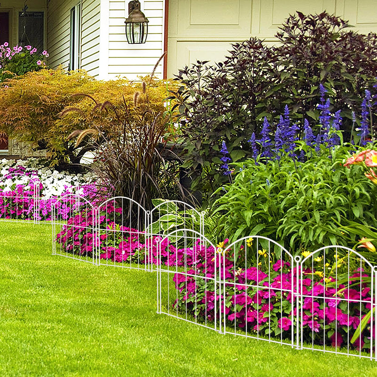 Thrivinest decorative border fence blends with greenery for a cohesive look.