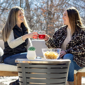 TIKI 304 stainless steel construction ensures durable weather-ready tabletop use.