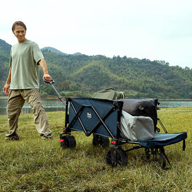 Timber Ridge all-terrain wheels on blue wagon for smooth sand travel
