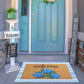 Blue and white striped Tinideya mat enhances porch decor.